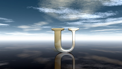 Image showing metal uppercase letter u under cloudy sky - 3d rendering