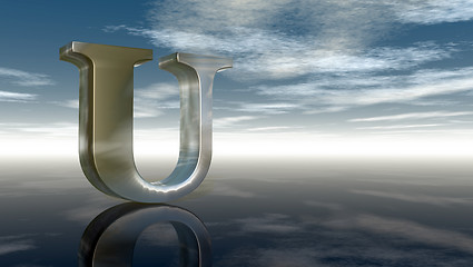 Image showing metal uppercase letter u under cloudy sky - 3d rendering