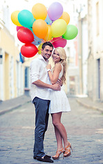 Image showing couple with colorful balloons
