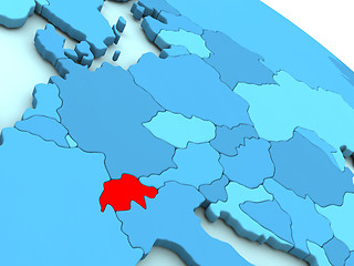 Image showing Switzerland in red on blue globe
