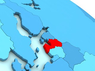 Image showing Latvia in red on blue globe