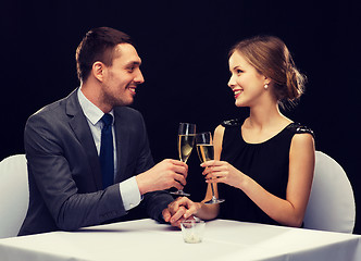 Image showing couple with glasses of champagne at restaurant