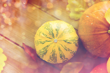 Image showing close up of pumpkins on wooden table at home