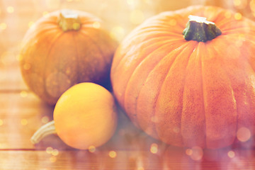 Image showing close up of pumpkins on wooden table at home