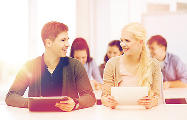 Image showing students looking at tablet pc in lecture at school