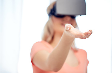 Image showing happy woman in virtual reality headset or glasses