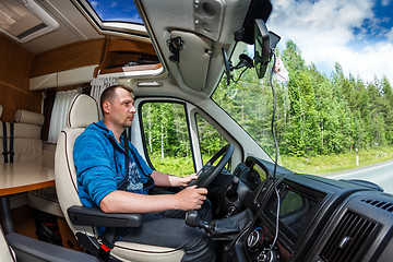 Image showing Man driving on a road in the Camper Van