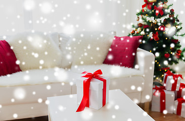 Image showing close up of christmas gift box on table at home