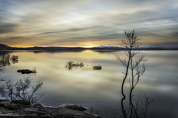 Image showing shiny lake photographed during the golden hour