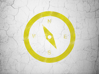 Image showing Tourism concept: Compass on wall background