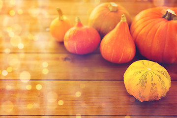 Image showing close up of pumpkins on wooden table at home