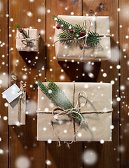 Image showing close up of christmas gifts with fir brunch