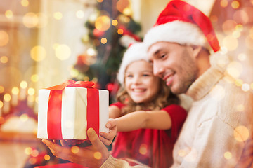 Image showing close up of father and daughter with gift box