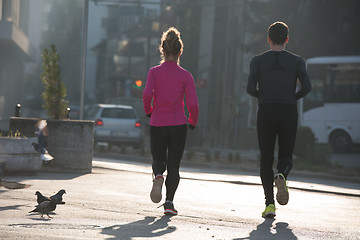 Image showing young  couple jogging