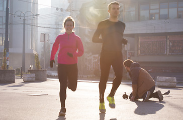 Image showing young  couple jogging