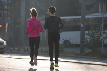 Image showing young  couple jogging