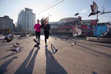 Image showing young  couple jogging