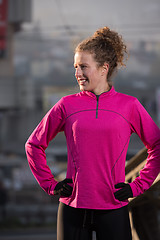 Image showing woman  stretching before morning jogging