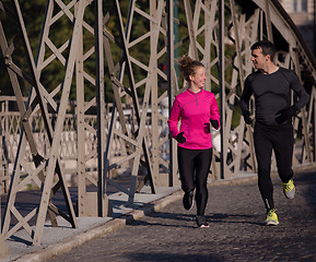 Image showing young  couple jogging