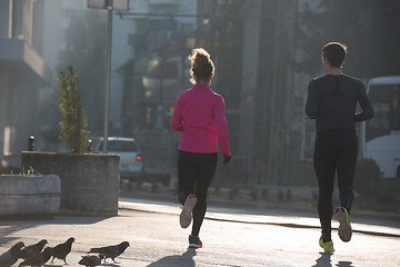 Image showing young  couple jogging