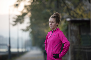 Image showing woman  stretching before morning jogging