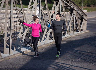 Image showing young  couple jogging