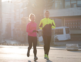 Image showing young  couple jogging