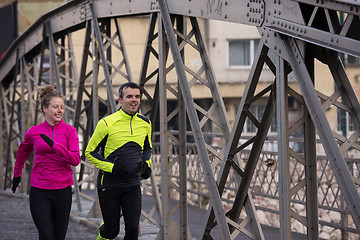 Image showing young  couple jogging