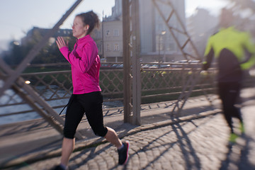 Image showing young  couple jogging