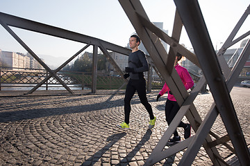 Image showing young  couple jogging