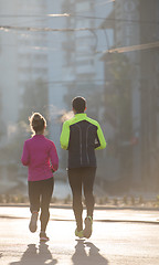 Image showing young  couple jogging