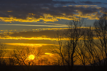 Image showing Landscape Dramatic sunset and sunrise sky with a silhouette of t