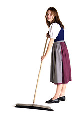 Image showing woman in Dirndl sweeps