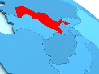 Image showing Uzbekistan in red on blue globe