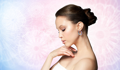 Image showing close up of beautiful woman face with earring