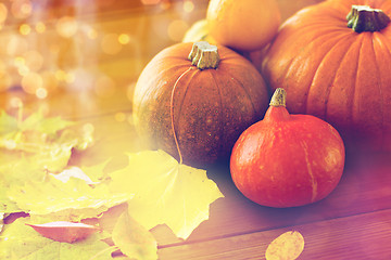 Image showing close up of pumpkins on wooden table at home