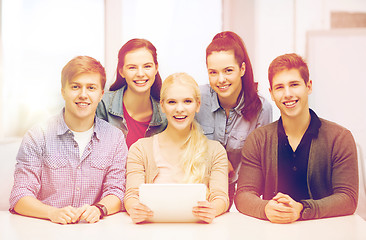 Image showing smiling students with tablet pc at school