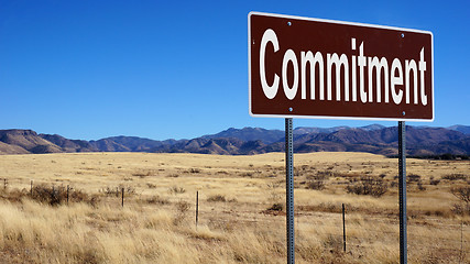 Image showing Commitment brown road sign