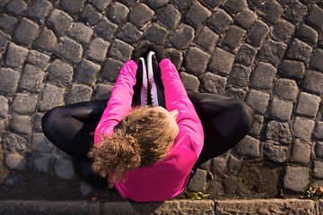 Image showing woman  stretching before morning jogging