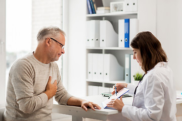 Image showing senior man and doctor meeting at hospital