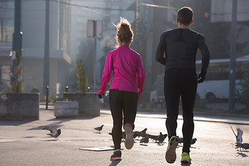 Image showing young  couple jogging