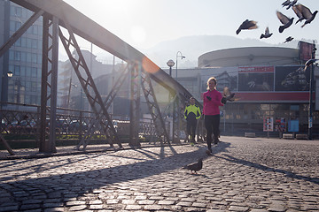 Image showing sporty woman jogging on morning