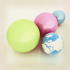 Image showing Pilates fitness ball and earth. 3D illustration. Vintage style.