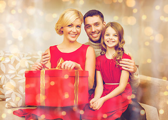 Image showing happy family opening gift box