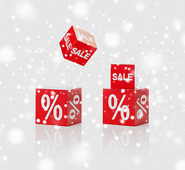 Image showing red boxes with sale and percent sign over snow