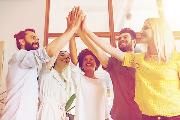 Image showing happy creative team in office