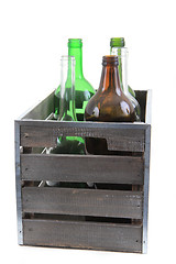 Image showing glass bottles in wooden case