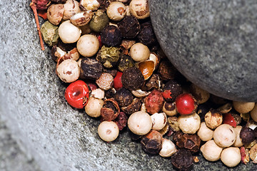 Image showing Pepper seeds in mortar