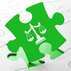 Image showing Law concept: Scales on puzzle background
