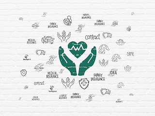 Image showing Insurance concept: Heart And Palm on wall background